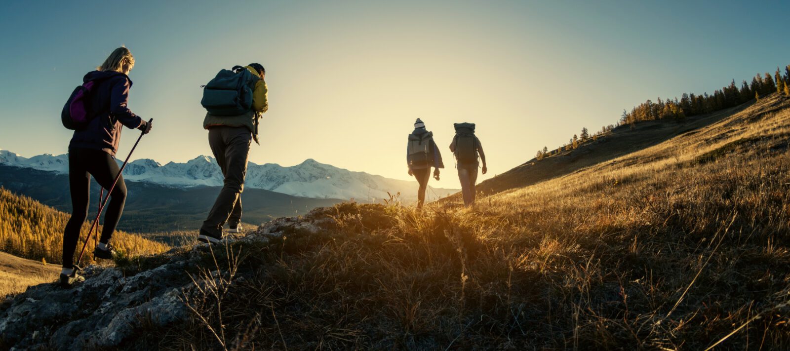 Hikers at sunset