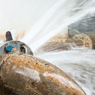 metal pipe with valve is leaking in water treatment plant