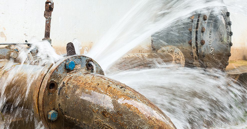 metal pipe with valve is leaking in water treatment plant